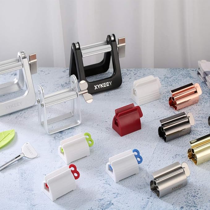 XYKEEY Toothpaste Tube Squeezer - Set of 2 Toothpaste Squeezer Rollers, Metal Toothpaste Tube Wringer Seat Holder Stand (Coral)