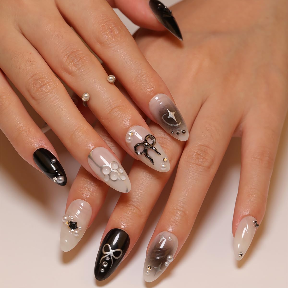 24Pcs Black Bow Press on Nails Medium Almond Fake Nails with 3D Alloy Bow Pearl Designs White Glitter False Nails Full Cover Artificial Glue on Nails Spring Summer Handmade Stick on Nails for Women