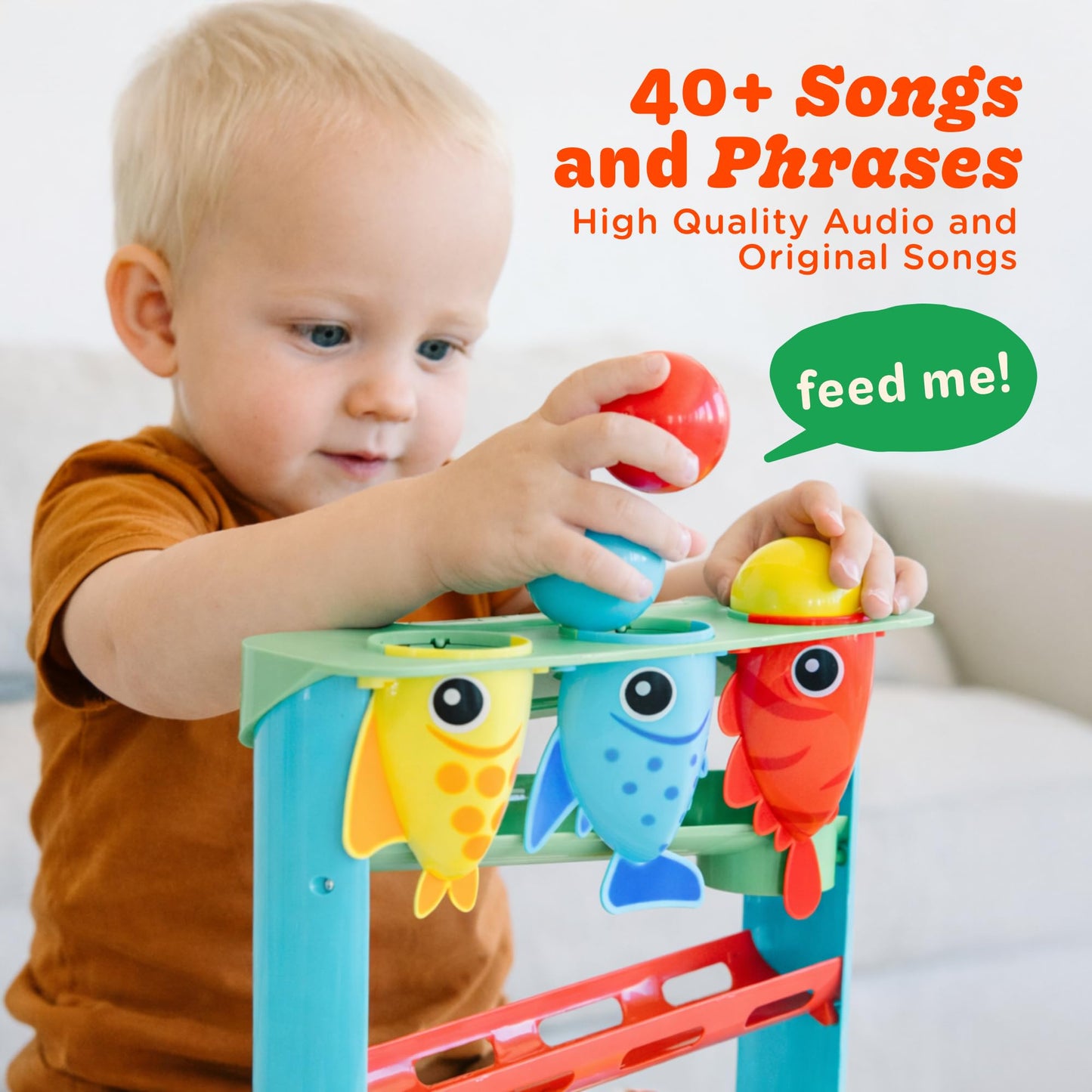 Move2Play, Feed The Fish | 30+ Fin-Tastic Songs & Phrases | Baby & Toddler Musical Toy | First Birthday Present for 1+ Year Old | Ages 6-24 Months | Boy & Girl Ball Drop Toy