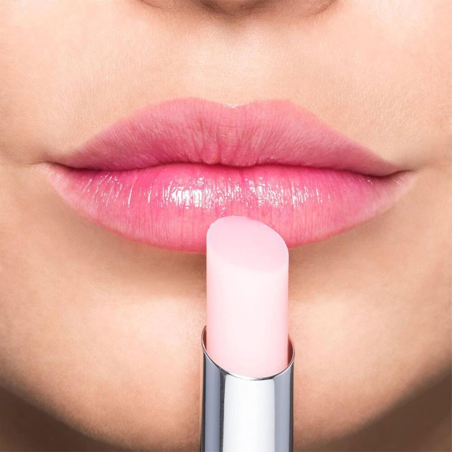 ARTDECO Color Booster Lip Balm in boosting pink - nourishing lip balm with color-adapting pigments - lip plumper with spearmint flavor - prevents dryness & chapping - lip care with kernel oil - 0.1 Oz