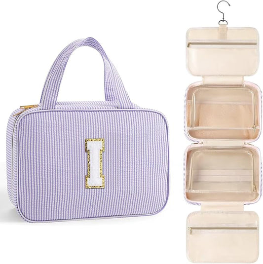TOPEAST Travel Toiletry Bag for Women - Hanging Toiletry Bag Makeup Bag, Portable Toiletries Cosmetic Bag, Airplane Travel Essentials - Letter I, Purple