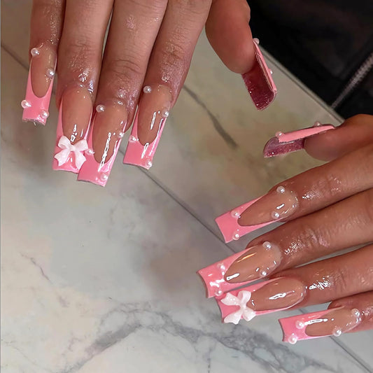 BABALAL Long Square Press on Nails Pink French tip Fake Nails with Bow Charm 24Pcs Acrylic Nails Supplies Pearl Stick on Nails with Glue Squoval Manicure Artificial Nails Art